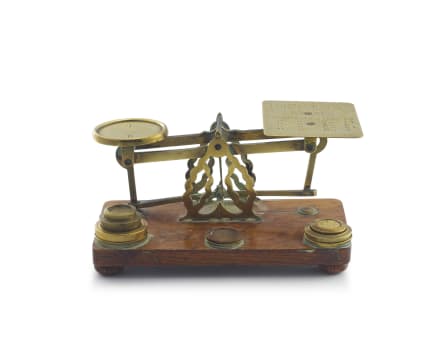 A brass postal scale, first half 20th century