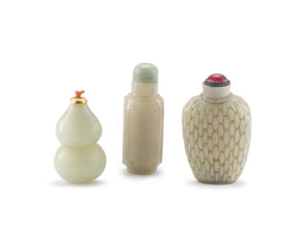 A Chinese celadon jade snuff bottle, late 19th/early 20th century