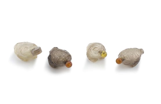 Four Chinese smokey quartz snuff bottles