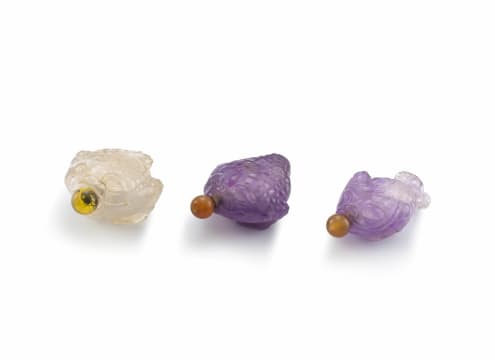 Two Chinese amethyst snuff bottles