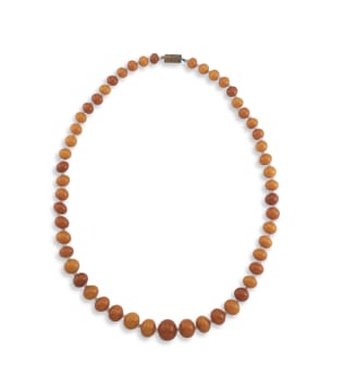 A Chinese amber and glassbead necklace, early 20th century