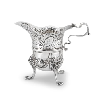 An Irish silver cream jug, apparently unmarked, Dublin, date letter worn, possibly 1760