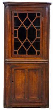 A George III oak corner cupboard