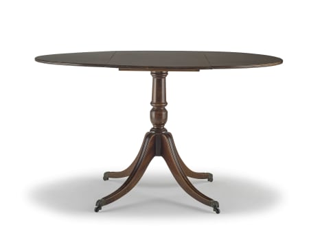 A George III style mahogany drop-leaf table, 20th century