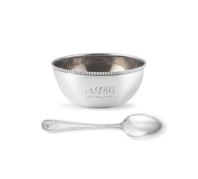 A cased George V silver 'Old English Bead' pattern bowl and spoon, with import marks for Birmingham, 1906, .925 sterling