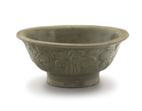 A Chinese provincial carved celadon-glazed bowl, 17th century