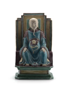 A Chinese Ming style stoneware figure of an Immortal, 19th century