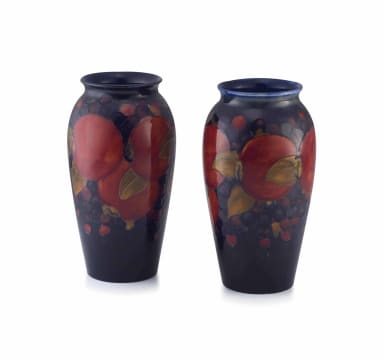 A matched pair of William Moorcroft 'Pomegranate' pattern vases, 1918