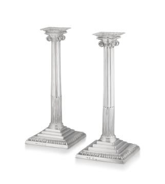 A pair of George II silver Corinthian candlesticks, Elizabeth Cooke, London, date letter worn, possibly 1757