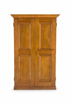 A pine and fruitwood cupboard, 20th century