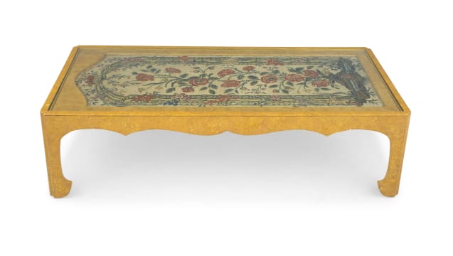 A painted and gilt occasional table