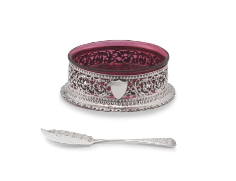 A Victorian silver and cranberry glass butter dish and 'Old English' pattern butter knife, George Unite, Birmingham, 1889