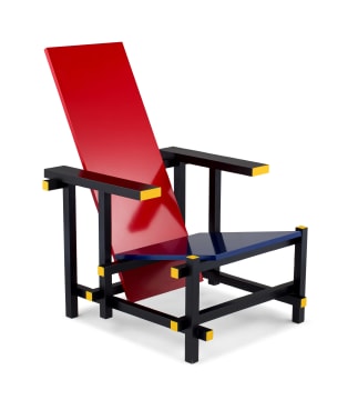 A model 763 red/blue armchair designed in 1923 by Gerrit Rietveld, later edition