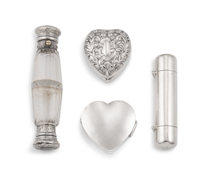 An Edward VII silver hinged trinket heart-shaped box, maker's mark indistinct, Birmingham, 1907