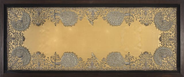 An Indian silk and metal thread embroidered table runner, late 19th/early 20th century