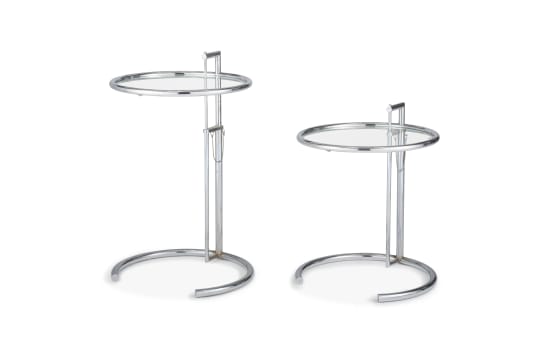 A pair of E1027 glass and chrome tables designed by Eileen Gray