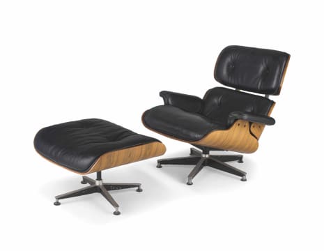 A leather and rosewood-veneered model 670 lounge chair and 671 ottoman designed in 1956 by Charles and Ray Eames, later editions, 1980s