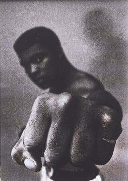 Thomas Hoepker; Muhammad Ali, world heavyweight champion showing off his left fist. Chicago, USA, 1966