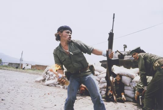 Susan Meiselas; 'Molotov Man'. Sandinistas at the Walls of the Esteli National Guard Headquarters. Esteli, Nicaragua. 1979.