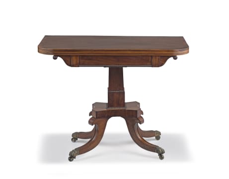 A Regency mahogany and rosewood tea table