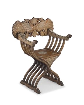 An Indian sandalwood, ebony and bone inlaid Savonarola armchair, 19th century