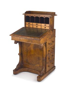 A mid Victorian burr-walnut and satinwood-veneered metamorphic davenport, John Howard & Son, Cabinet Manufacturers & Upholsterers, 22 Berners St, Oxford St, London