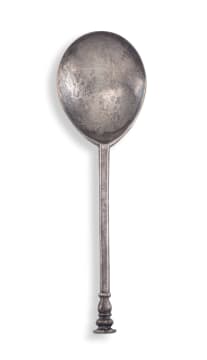 A silver seal top spoon, bears the mark of London, 1627 Strauss Co