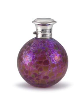 An Isle of Wight iridescent purple glass and silver-mounted perfume bottle, possibly Timothy Harris, WW, with import marks for London, 1961, .925 sterling