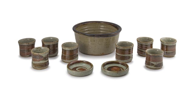Eight drinking beakers, pair of saucer dishes and a large bowl