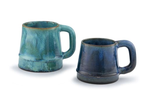 A Linn Ware mottled sea green-glazed tankard