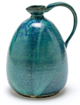 A Globe mottled green and blue-glazed ewer