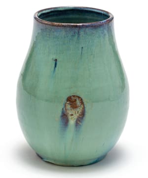A South African ceramic mottled green and indigo-glazed vase