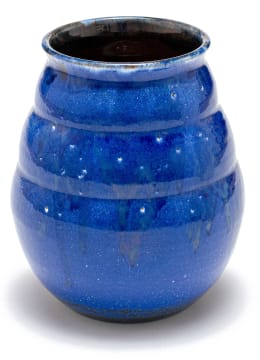 A South African ceramic dark blue-glazed vase