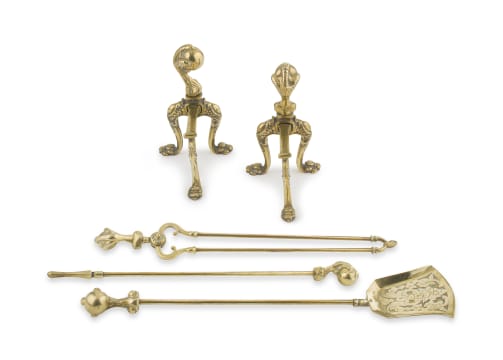 A set of three brass fire irons