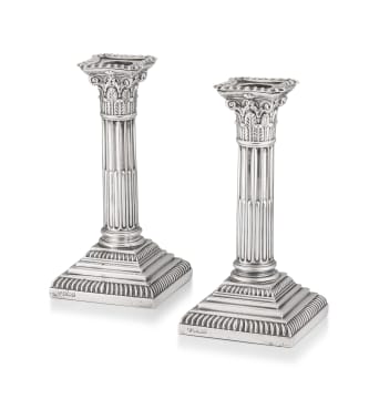 A pair of Edward VII silver Corinthian candlesticks, Hawksworth, Eyre & Co Ltd, Sheffield, 1906