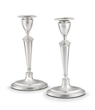 A pair of Edward VII silver candlesticks, Thomas A Scott, Sheffield, 1904