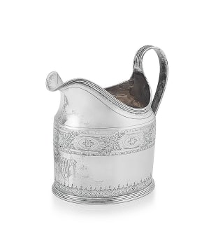 A George III silver milk jug, maker's mark rubbed, London, 1799