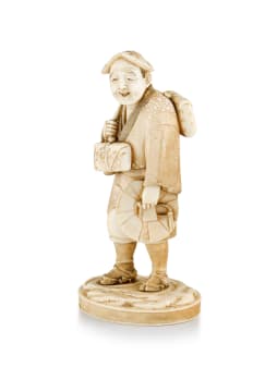 A Japanese ivory okimono of a rice farmer, Meiji period, 1868-1912
