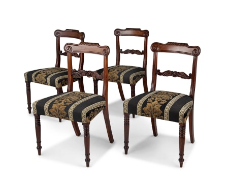 A set of four Regency mahogany dining chairs