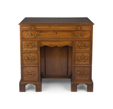 A George III mahogany bureau-table, circa 1760