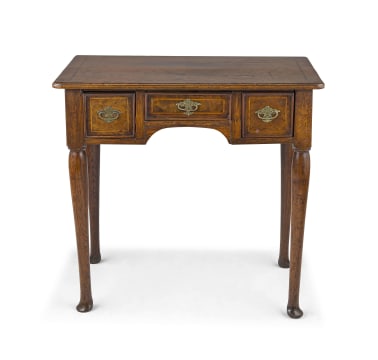 A George I walnut and oak lowboy, circa 1715