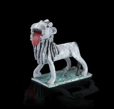 Nico Masemola; A Grey and Black-glazed Medici Lion