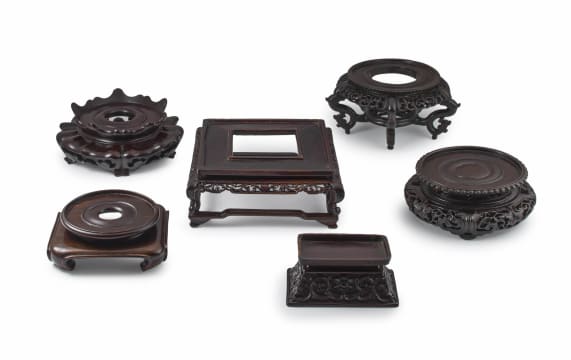 A collection of six Chinese hardwood stands, Qing Dynasty, 18th/19th century