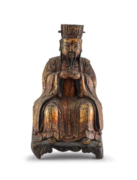 A Chinese gilt-bronze of a deity, Qing Dynasty, 18th/19th century
