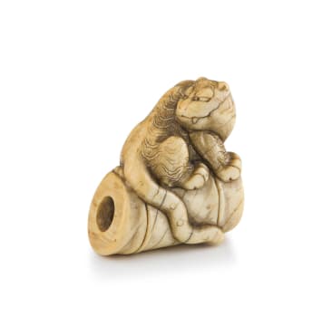 A Japanese ivory netsuke of a tiger, Meiji period, 1868-1912