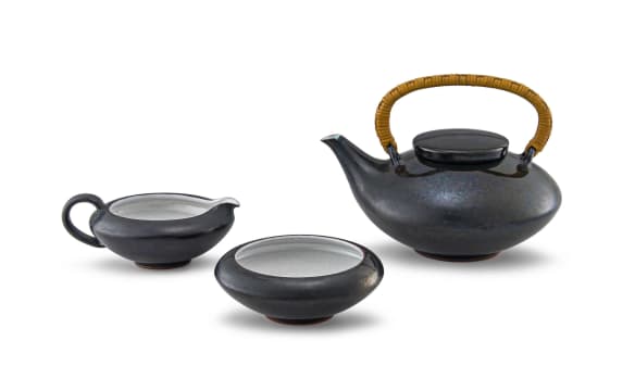A Danish three-piece Zeuthen Keramik mirror black-glazed tea service, designed by Edith Nielsen, 1960s
