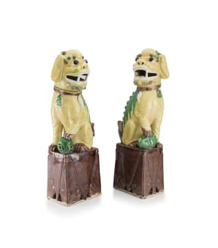 A pair of Chinese yellow, green, cream and aubergine-glazed dogs-of-fo, late 19th century