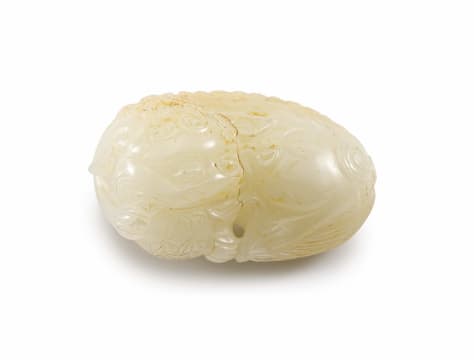 A Chinese jade carving of a dog-of-fo, Qing Dynasty, 19th century