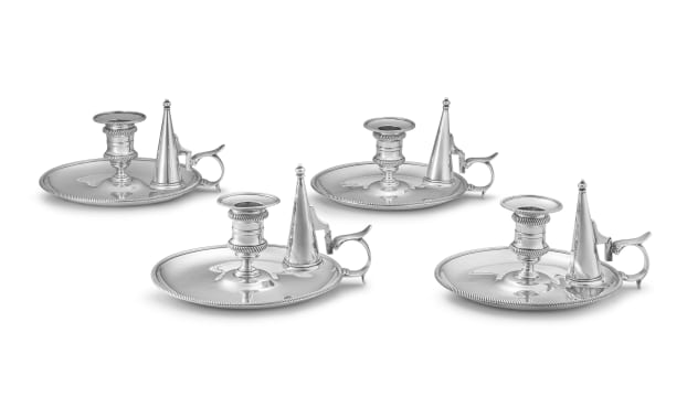 Four Victorian silver chambersticks and snuffers, Robert Garrard, London, 1864