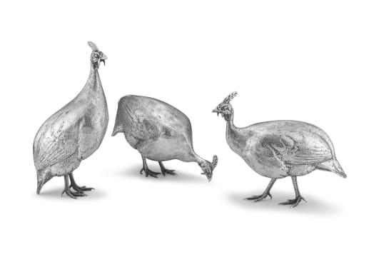 A set of three Zimbabwean silver helmeted guinea fowl, Patrick Mavros, 1994